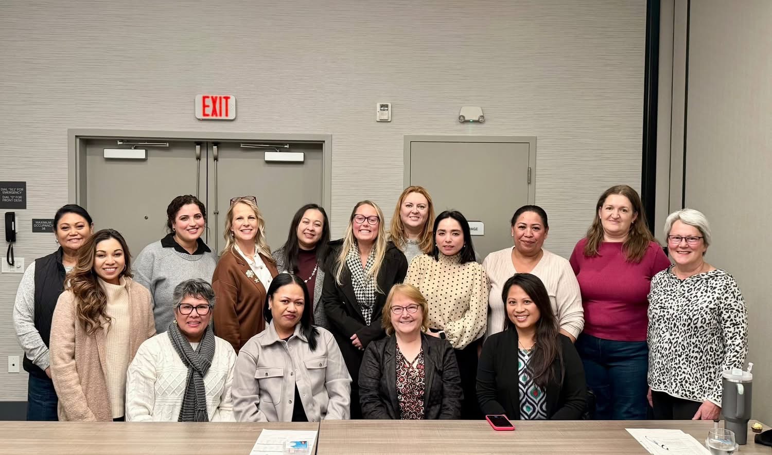 Women from The Circle smiling together for a group photo